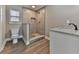 Bathroom with large walk-in shower and toilet at 445 Milton Dr, Canton, GA 30114