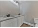 Double vanity bathroom with granite countertop at 445 Milton Dr, Canton, GA 30114