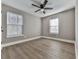Bedroom with ceiling fan and two windows at 445 Milton Dr, Canton, GA 30114