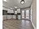 Modern kitchen with white cabinets and a dark tile backsplash at 445 Milton Dr, Canton, GA 30114