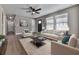 Spacious living room featuring hardwood floors, neutral walls, and a comfy seating area at 445 Milton Dr, Canton, GA 30114