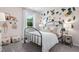 Charming bedroom with accent wall and metal bed frame at 1346 Auburn Glen Rd, Dacula, GA 30019