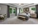 Spacious main bedroom with tray ceiling and large windows at 1346 Auburn Glen Rd, Dacula, GA 30019