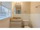Updated bathroom with granite vanity and white subway tile at 2230 Star Mist Sw Dr, Atlanta, GA 30311