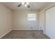 Spacious bedroom with neutral walls, carpet, and ample closet space at 2230 Star Mist Sw Dr, Atlanta, GA 30311