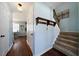 Inviting entryway with hardwood floors, coat rack, and staircase at 230 Bennett Farms Trl, Acworth, GA 30102