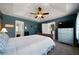 Main bedroom with vaulted ceiling, ceiling fan, and large windows at 230 Bennett Farms Trl, Acworth, GA 30102