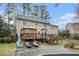 Spacious backyard showcasing a deck and patio area, perfect for outdoor entertaining at 515 Lees Sw Trce, Marietta, GA 30064