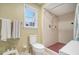 Clean, white bathroom with updated shower and fixtures at 515 Lees Sw Trce, Marietta, GA 30064