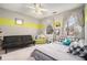 Cozy bedroom with updated flooring, neutral walls and a large window at 515 Lees Sw Trce, Marietta, GA 30064