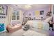 Charming bedroom featuring a cozy bed with built-in storage, plush furniture, and whimsical décor at 515 Lees Sw Trce, Marietta, GA 30064