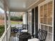 Inviting front porch with seating, creating a warm and welcoming entrance to the home at 515 Lees Sw Trce, Marietta, GA 30064