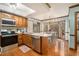 Well-appointed kitchen featuring stainless steel appliances, breakfast nook and hardwood floors at 515 Lees Sw Trce, Marietta, GA 30064