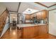 Bright kitchen features stainless steel appliances, center island, and access to adjacent rooms at 515 Lees Sw Trce, Marietta, GA 30064