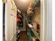 Walk-in closet with ample shelving and storage, ideal for organizing clothes, shoes, and accessories at 515 Lees Sw Trce, Marietta, GA 30064