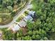 Aerial view of the neighborhood with new homes nestled amongst mature trees at 4412 Brookview Se Dr, Atlanta, GA 30339