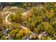Aerial view of a residential community nestled in a wooded area with winding roads at 4412 Brookview Se Dr, Atlanta, GA 30339