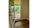 Basement features a door to backyard patio and hardwood floors at 4412 Brookview Se Dr, Atlanta, GA 30339