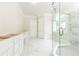 Elegant bathroom with marble flooring and a walk-in shower at 4412 Brookview Se Dr, Atlanta, GA 30339