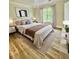 Bedroom with hardwood floors and large window at 4412 Brookview Se Dr, Atlanta, GA 30339