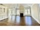 Spacious living room with hardwood floors, fireplace, and large windows offering natural light at 4412 Brookview Se Dr, Atlanta, GA 30339