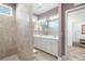 Bathroom with walk-in shower and double vanity at 4980 Pleasantry Nw Way, Acworth, GA 30101