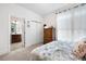 Bright bedroom with ensuite bathroom access, double closets and natural light at 4980 Pleasantry Nw Way, Acworth, GA 30101