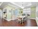Elegant dining room with hardwood floors, a china cabinet, and a formal dining set at 4980 Pleasantry Nw Way, Acworth, GA 30101