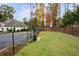 Fenced dog park with waste disposal and benches at 4980 Pleasantry Nw Way, Acworth, GA 30101