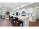 Modern kitchen with granite island, white cabinets and stainless steel appliances at 4980 Pleasantry Nw Way, Acworth, GA 30101