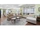 Open living room with a view into the kitchen and comfortable seating at 4980 Pleasantry Nw Way, Acworth, GA 30101