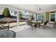 Covered patio with comfortable seating and backyard view at 4980 Pleasantry Nw Way, Acworth, GA 30101