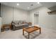 Finished basement includes neutral carpet and cozy sitting area at 5025 Hidden Ct, Cumming, GA 30040