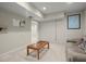 Finished basement includes neutral carpet and a cozy sitting area at 5025 Hidden Ct, Cumming, GA 30040