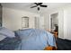 Cozy bedroom with a ceiling fan and an ensuite bathroom at 5025 Hidden Ct, Cumming, GA 30040