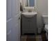 Small bathroom with updated vanity and flooring at 2739 Plennie Ln, Lawrenceville, GA 30044