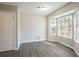 Dining room with bay window and wood-look floors at 3794 Whaley Ct, Snellville, GA 30039