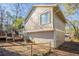 Side view of tan house with deck at 3794 Whaley Ct, Snellville, GA 30039