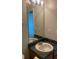 A bathroom vanity features a round sink and granite countertop at 2080 Winding Crossing Trl, Fairburn, GA 30213