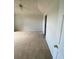 Bedroom with sloped ceiling, carpet flooring and natural lighting at 2080 Winding Crossing Trl, Fairburn, GA 30213