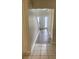 View of the entryway, showcasing hardwood floors and a white front door at 2080 Winding Crossing Trl, Fairburn, GA 30213