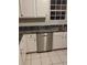 Kitchen with white cabinets, stainless steel appliances, and tile flooring at 2080 Winding Crossing Trl, Fairburn, GA 30213