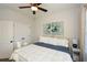 Bright bedroom featuring a comfortable queen bed and double doors at 234 Fieldbrook Xing, Canton, GA 30115