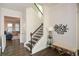 Elegant staircase with dark wood railing leading to the second floor at 234 Fieldbrook Xing, Canton, GA 30115