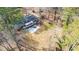 House with large backyard surrounded by trees at 4653 Flat Bridge Sw Rd, Stockbridge, GA 30281