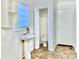 Small bathroom with pedestal sink and toilet at 4653 Flat Bridge Sw Rd, Stockbridge, GA 30281