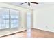 Bright bedroom with wood floors and large windows at 4653 Flat Bridge Sw Rd, Stockbridge, GA 30281