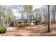 Ranch home with attached garage and a wooded setting at 4653 Flat Bridge Sw Rd, Stockbridge, GA 30281