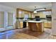 Kitchen with island, access to patio and wood floors at 4653 Flat Bridge Sw Rd, Stockbridge, GA 30281