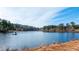 Serene lake view with a floating dock at 4653 Flat Bridge Sw Rd, Stockbridge, GA 30281